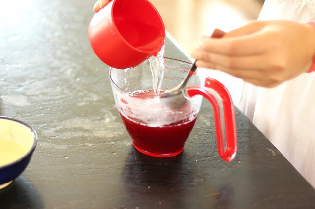 pouring the water into mixture