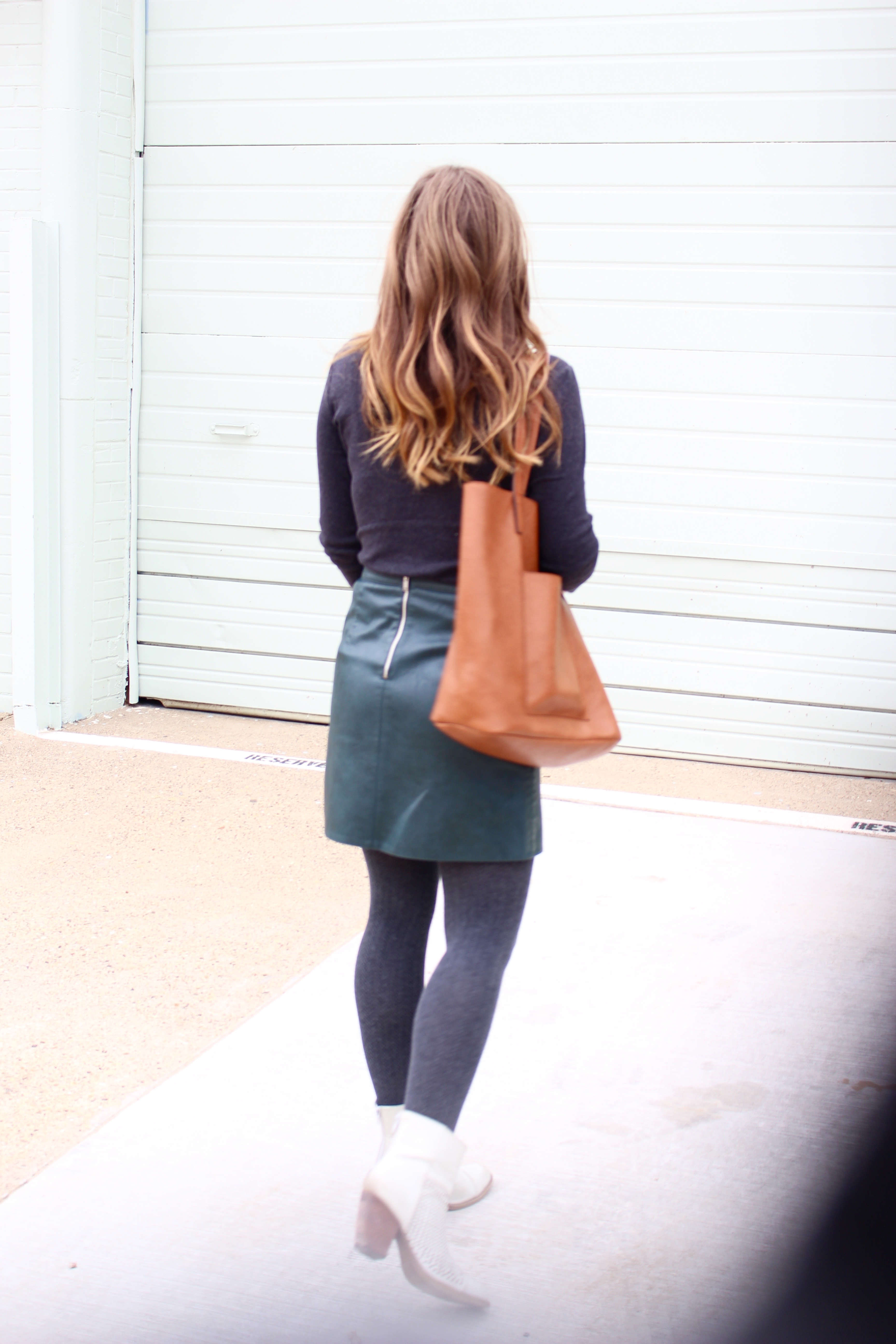 complete outfit of a leather skirt - Green Leather Skirt by popular Texas fashion blogger Audrey Madison Stowe