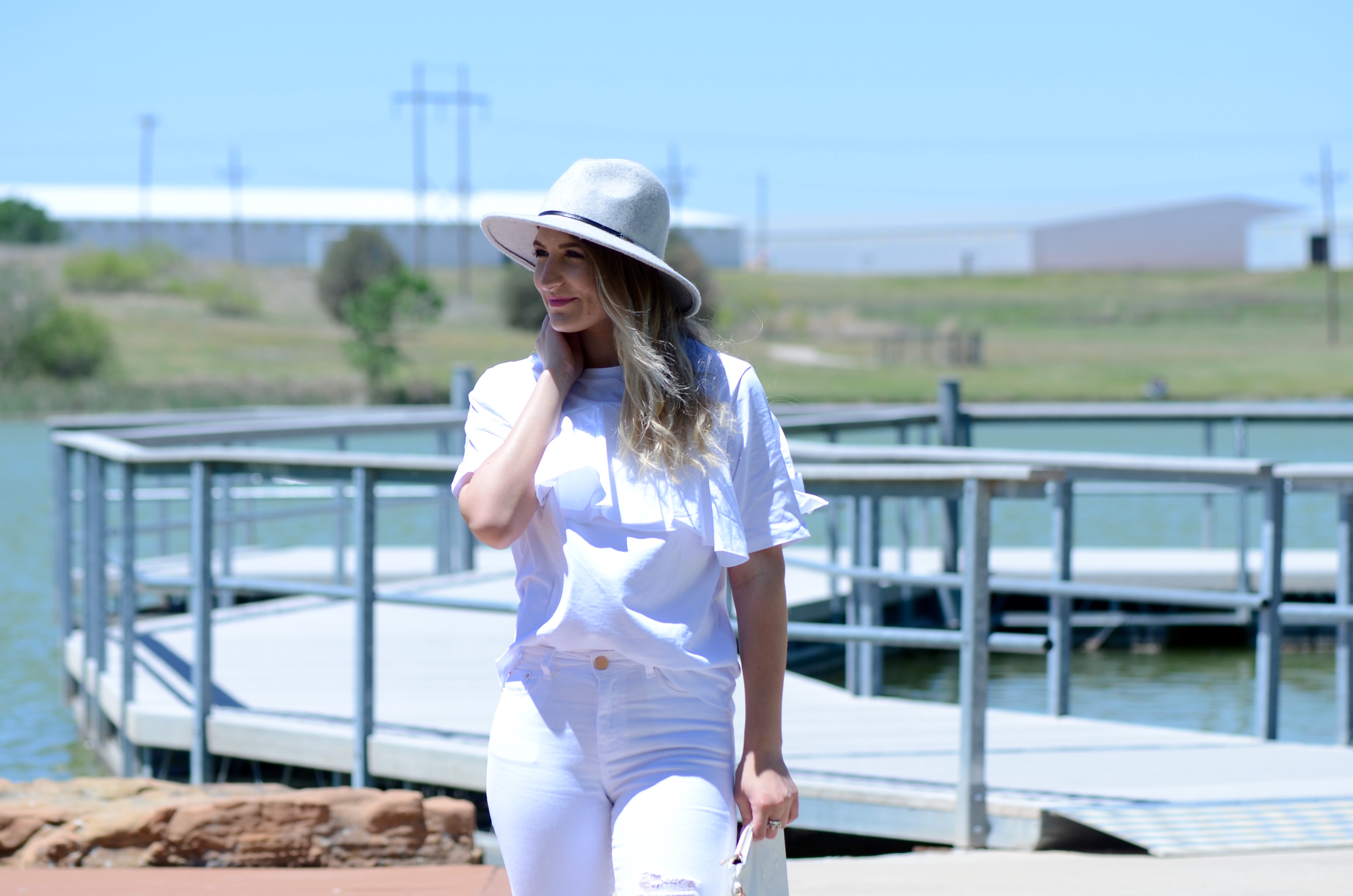 grey felt hat and an all white look