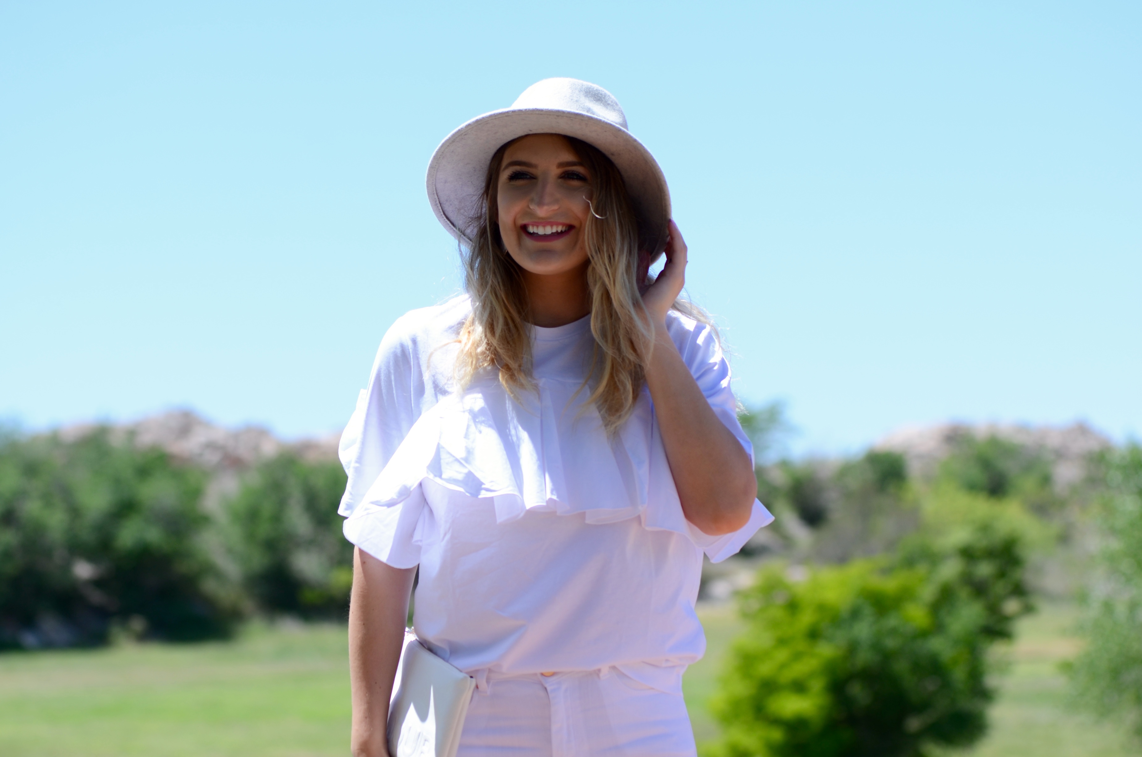 white ruffled top