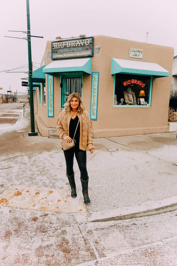 Santa Fe Weekend featured by top US travel blogger Audrey Madison Stowe; Image of woman walking down the street.