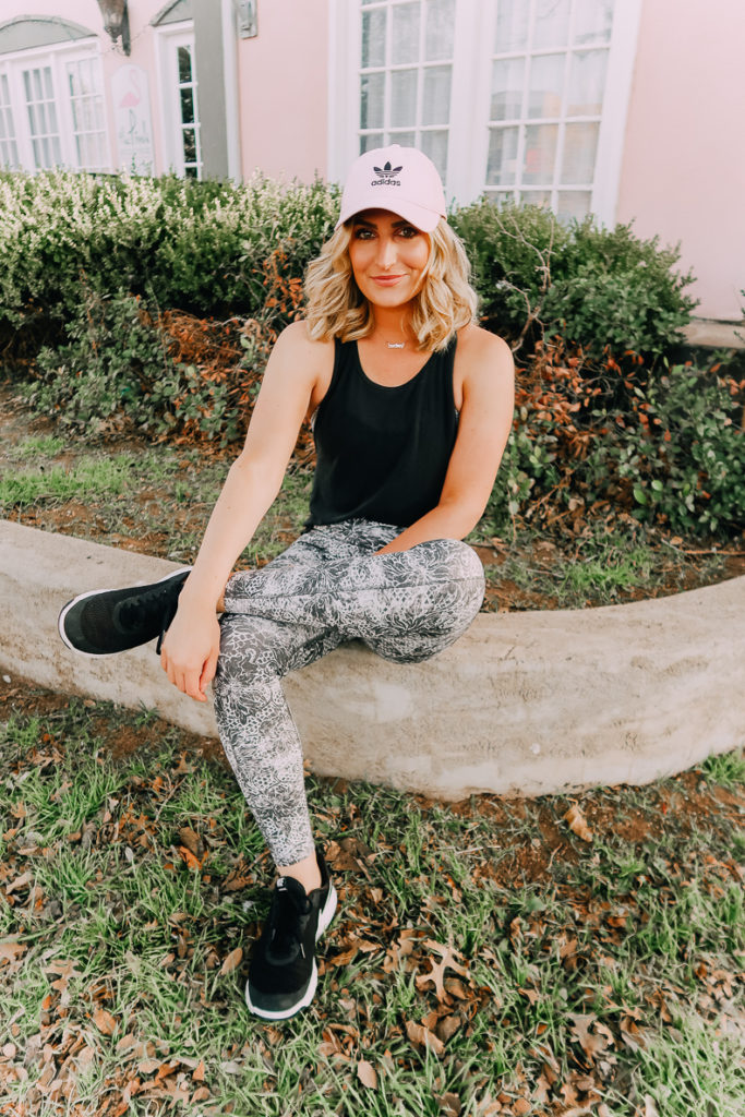 Orangetheory Transformation Challenge featured by top US life and style blogger Audrey Madison Stowe; Image of woman wearing a fun workout outfit.