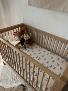 Crib details for a neutral nursery | Audrey Madison Stowe